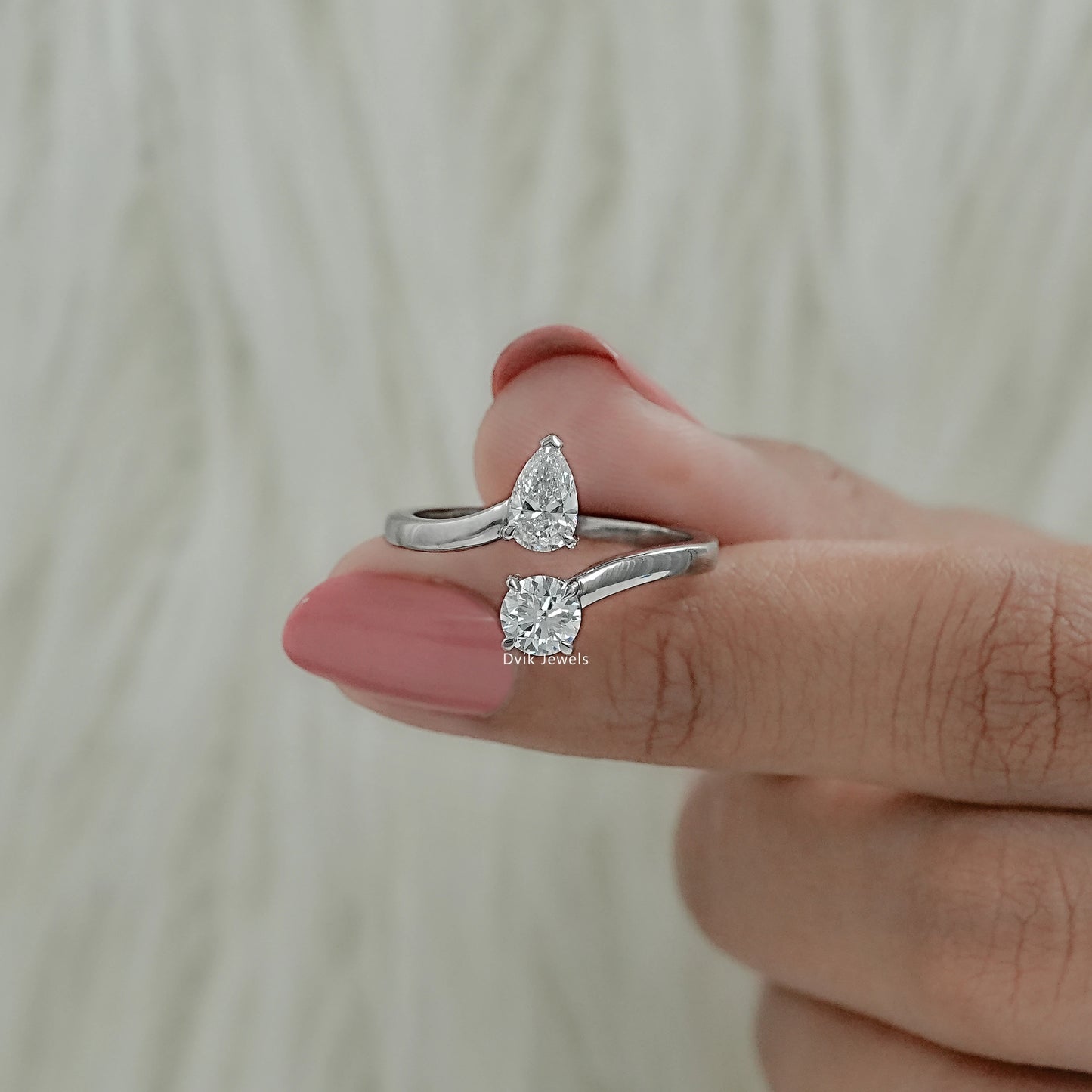 Front view of Lab created diamond engagement ring with open bypass design