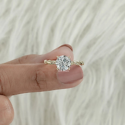Round Cut Solitaire Engagement Ring with Twisted Diamond Band