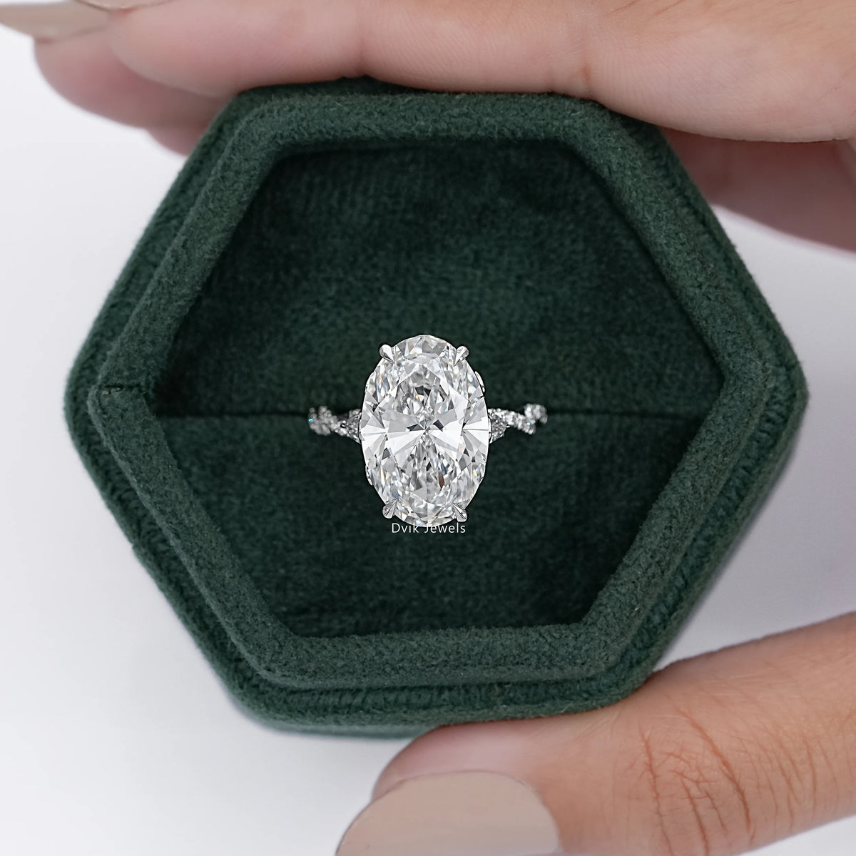 Oval Cut Diamond Twisted Hidden Halo Ring
