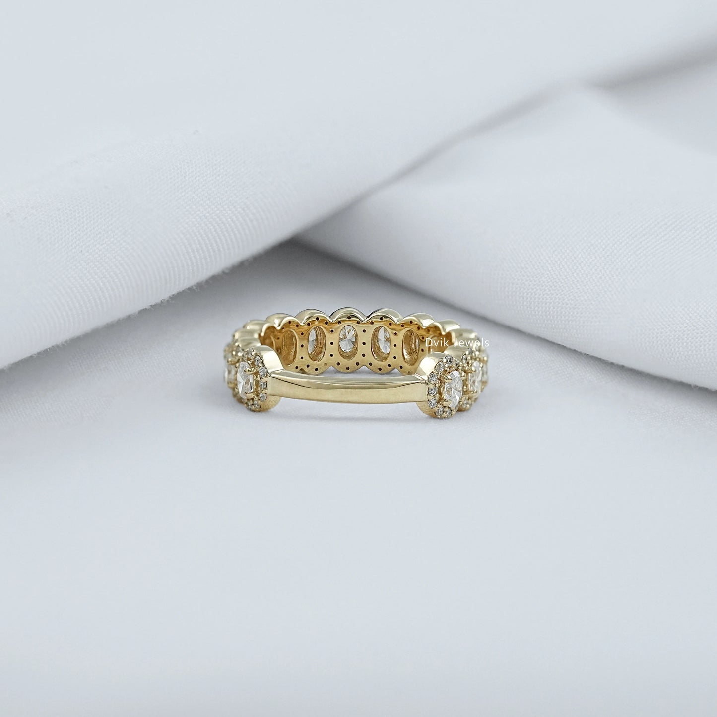 Oval cut cluster ring featuring sparkling lab grown diamonds.