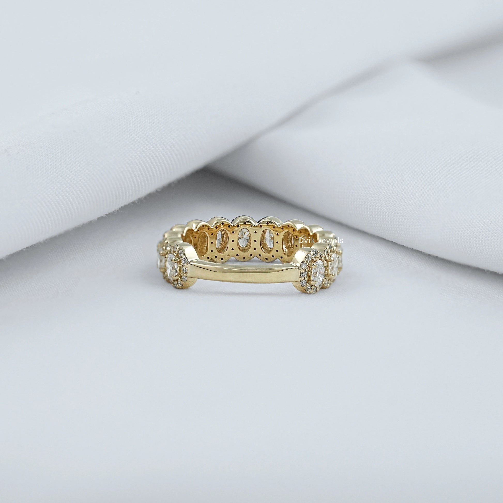 Oval cut cluster ring featuring sparkling lab grown diamonds.