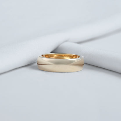 Gypsy diamond ring displayed on a soft fabric for a professional top view