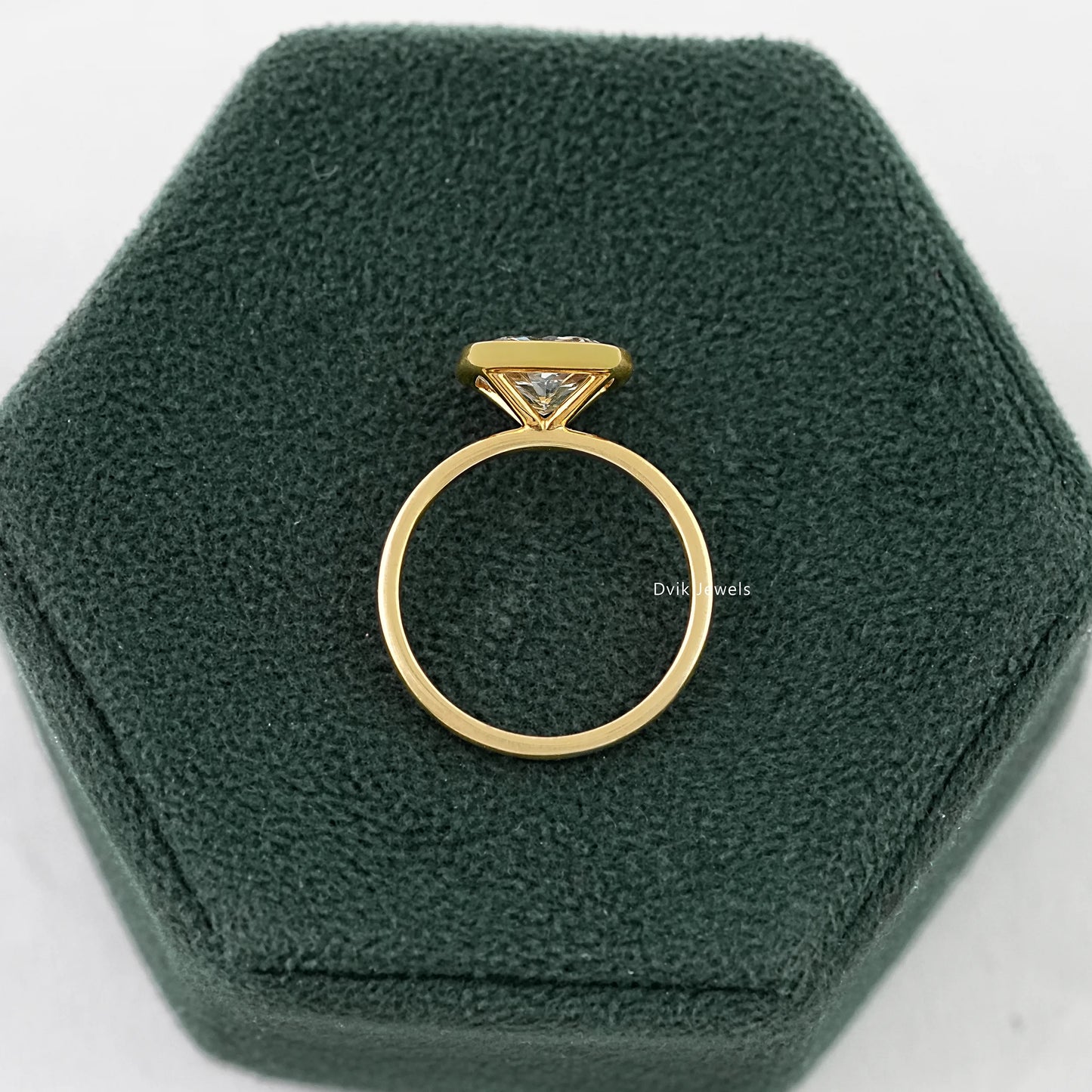 Cushion Cut East-West Bezel Solitaire Engagement Ring Ring