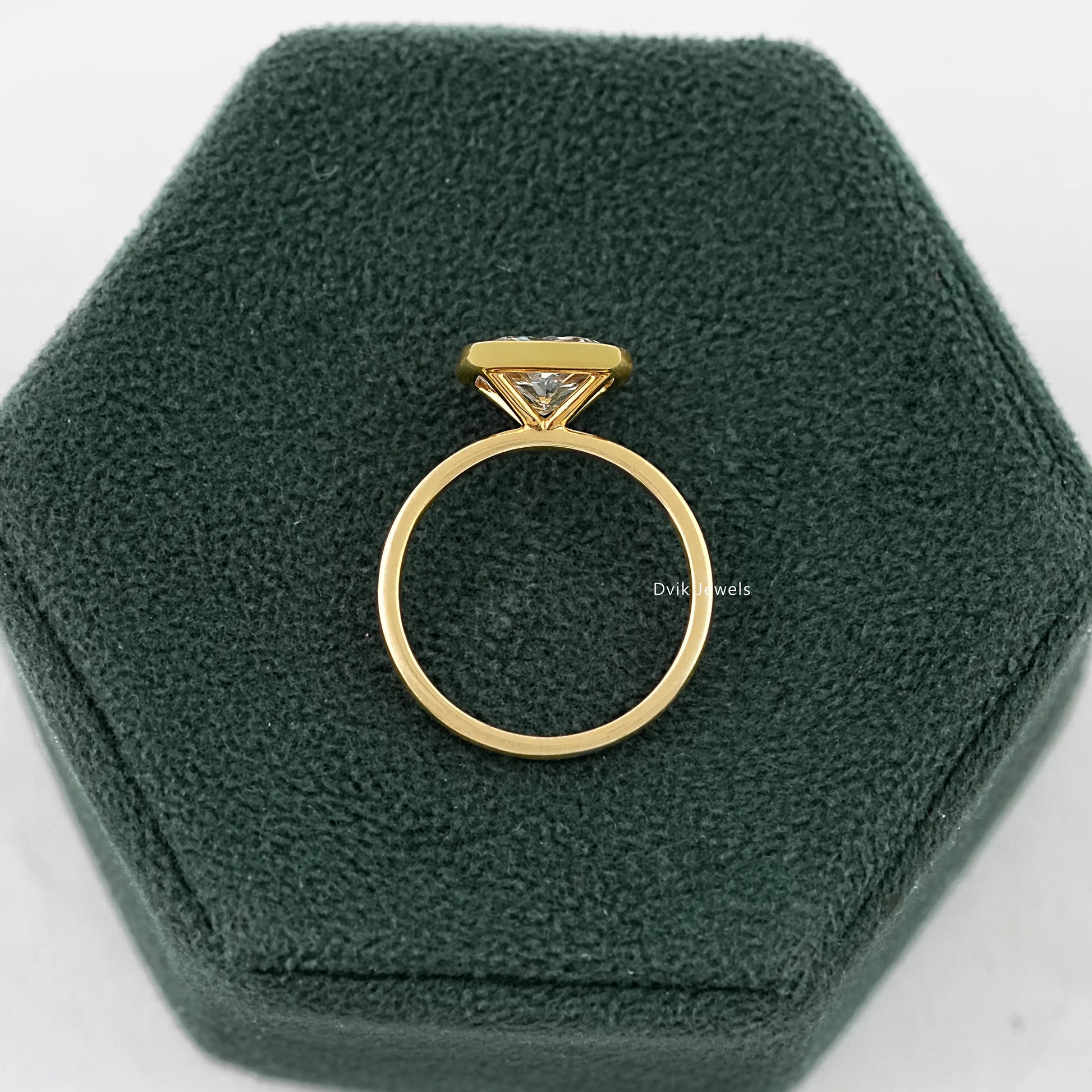 Cushion Cut East-West Bezel Solitaire Engagement Ring Ring