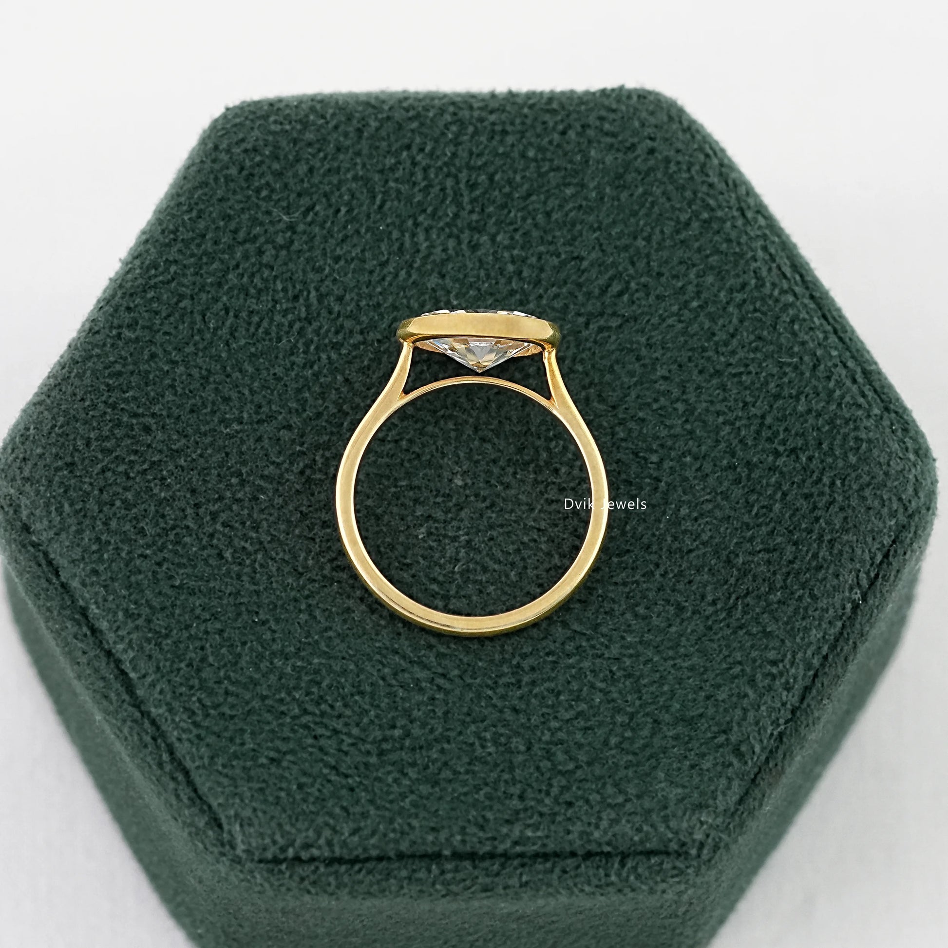 Oval East-West Bezel Engagement Ring Ring