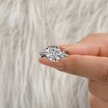 infinity engagement ring diamond on finger highlighting the high-polish band view