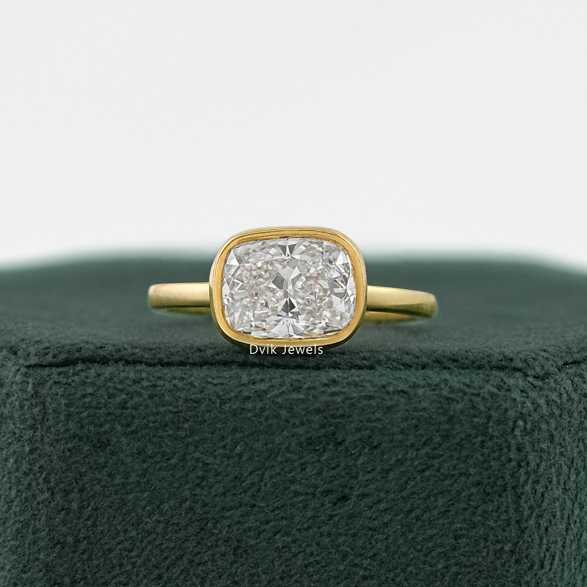 Cushion Cut East-West Bezel Solitaire Engagement Ring Ring