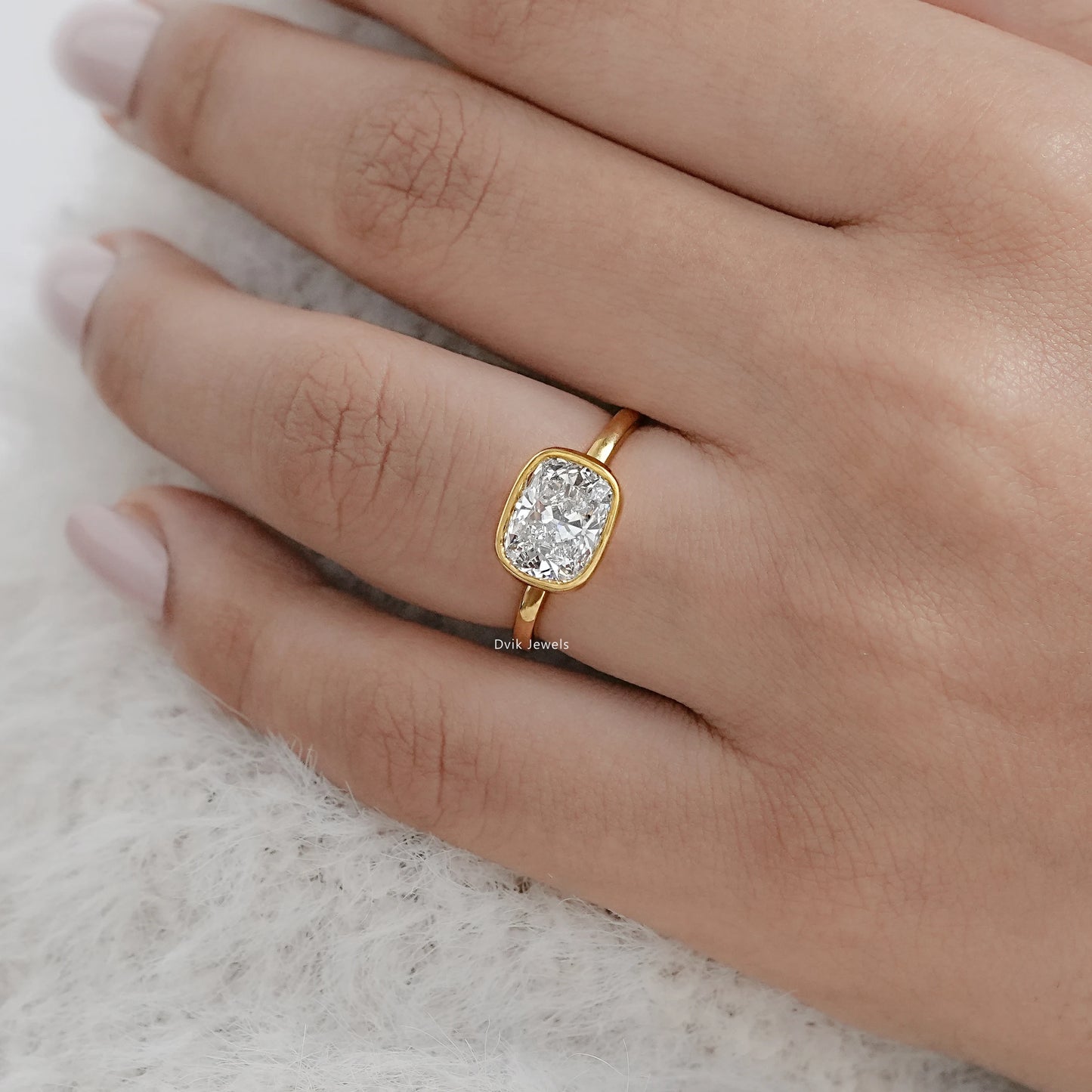 Cushion Cut East-West Bezel Solitaire Engagement Ring Ring