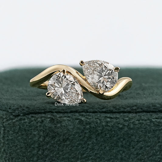 curved wedding band for pear shaped by Dvik Jewels in 3-prong v-tip set angle view