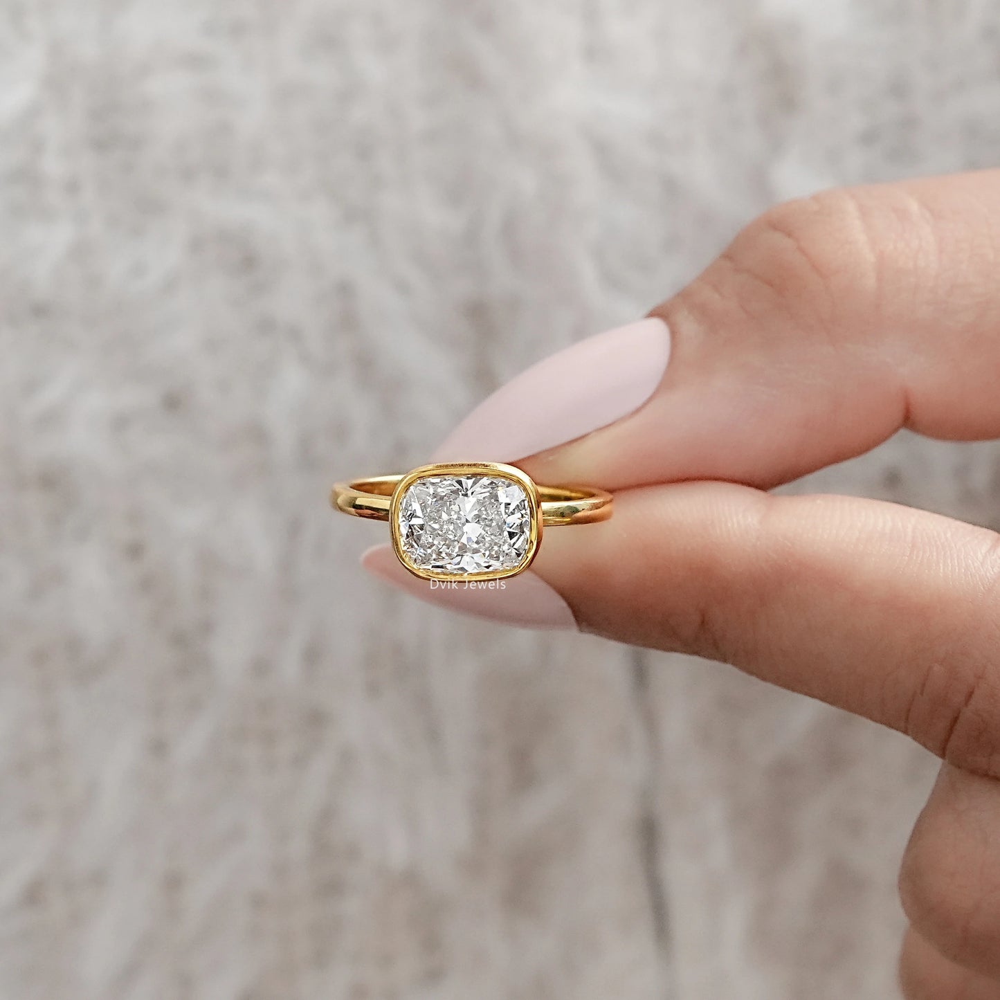 Cushion Cut East-West Bezel Solitaire Engagement Ring Ring