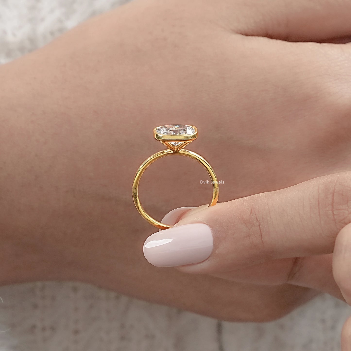 Cushion Cut East-West Bezel Solitaire Engagement Ring Ring