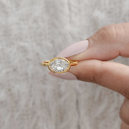 Oval East-West Bezel Engagement Ring Ring