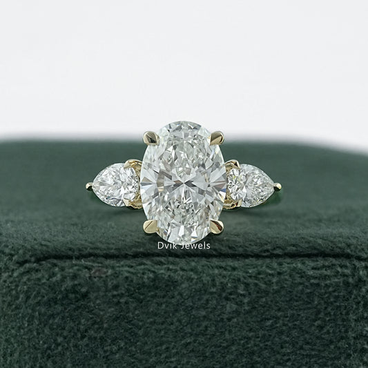 Oval and Pear Cut Lab Diamond Three Stone Ring Ring