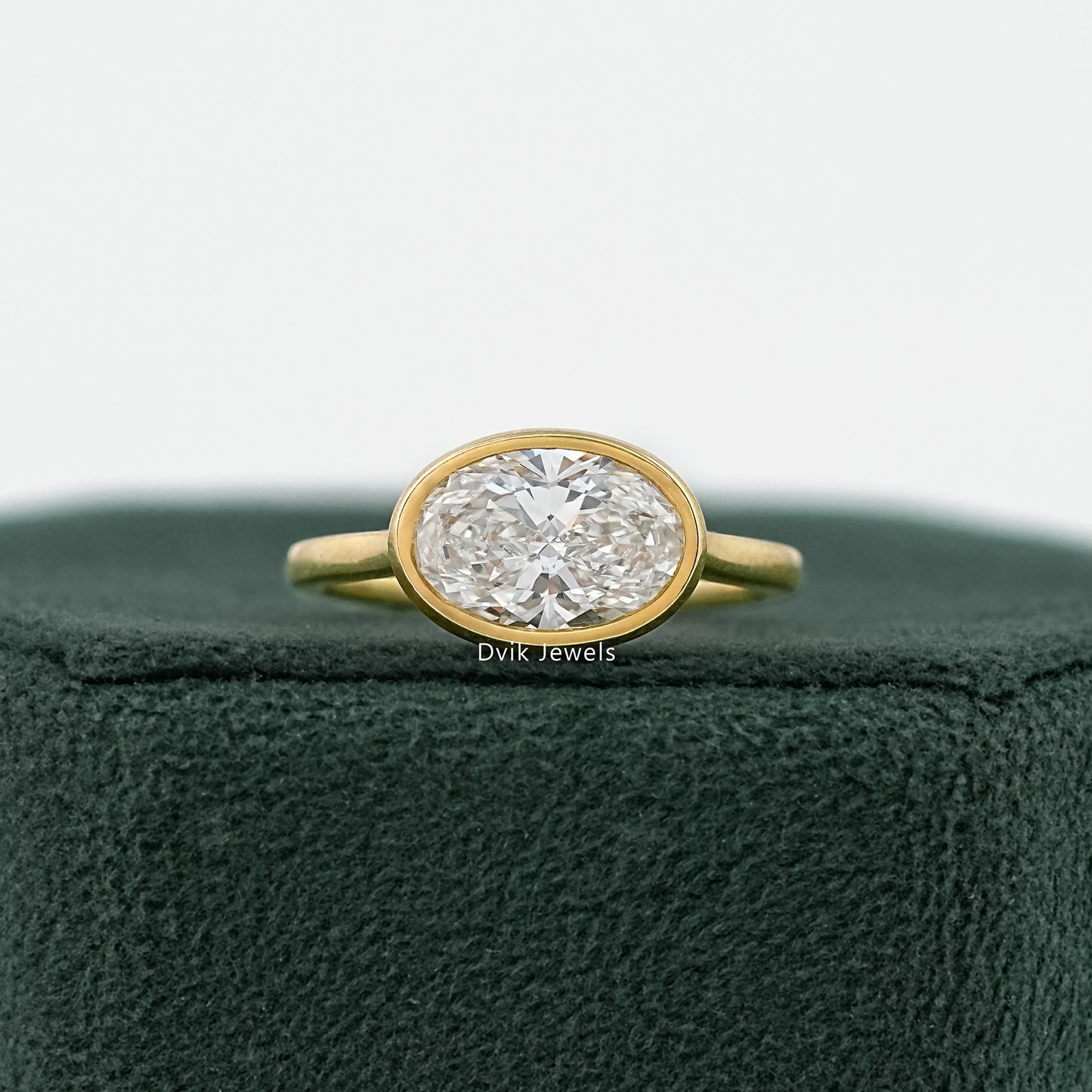 Oval East-West Bezel Engagement Ring Ring