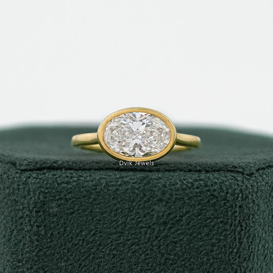 Oval East-West Bezel Engagement Ring Ring