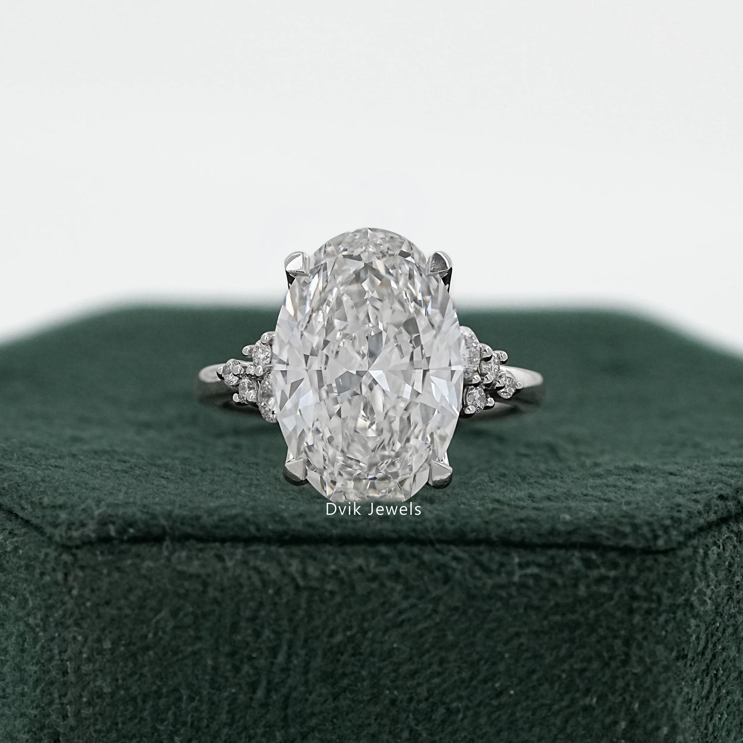 Oval Cut Lab Diamond Solitaire Ring with Cluster Accent Shoulders Ring
