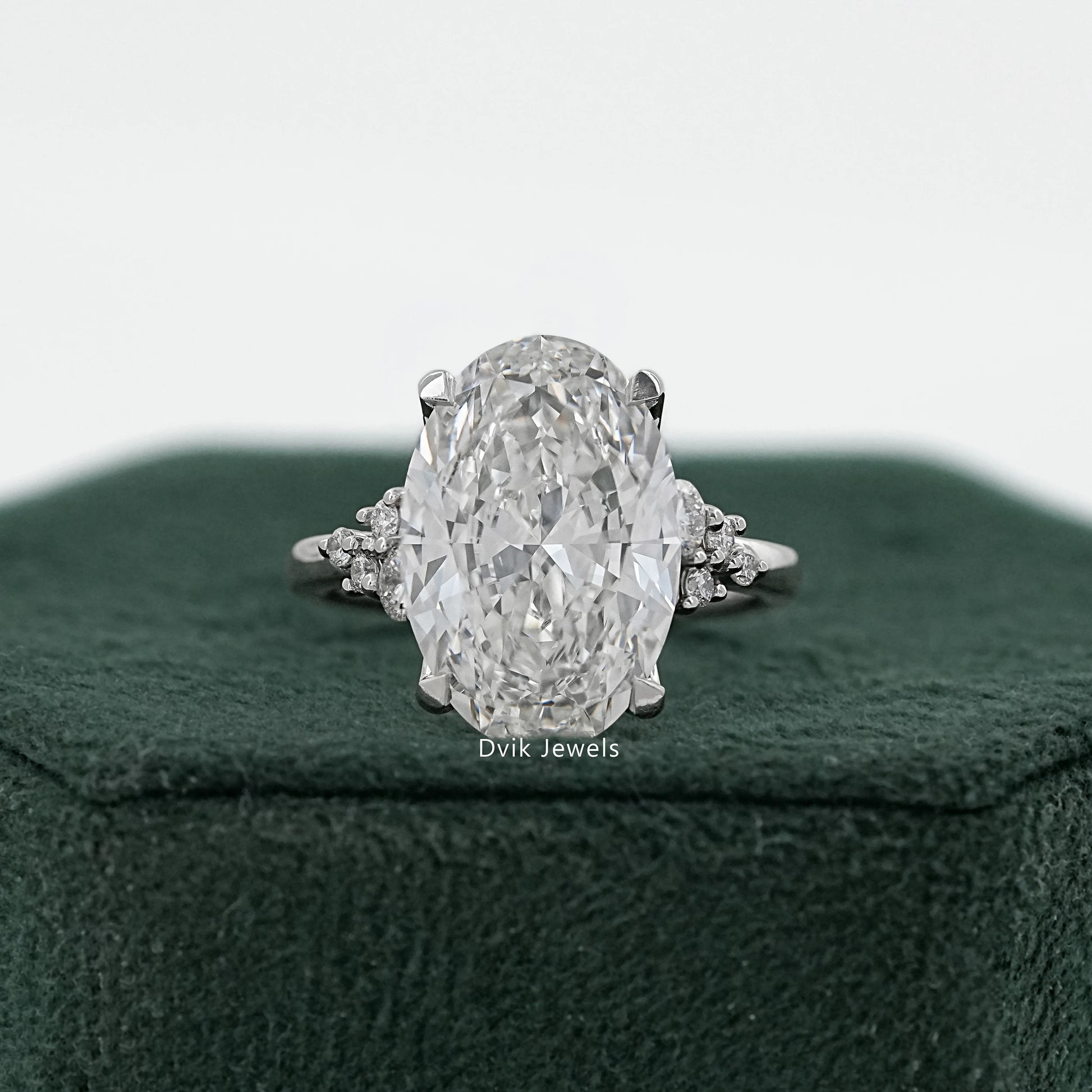 Oval Cut Lab Diamond Solitaire Ring with Cluster Accent Shoulders Ring