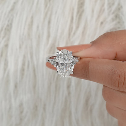 Oval Cut Lab Diamond Solitaire Ring with Cluster Accent Shoulders Ring