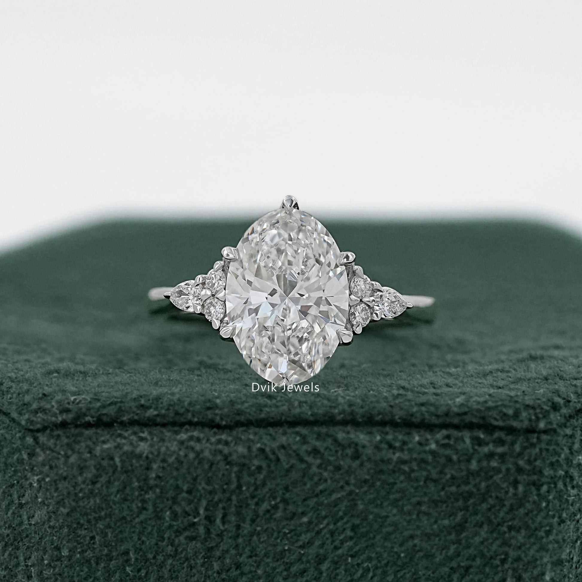 Oval Lab Diamond Three Stone Ring with Pear and Round Accents Ring