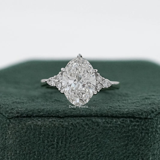 Oval Lab Diamond Three Stone Ring with Pear and Round Accents
