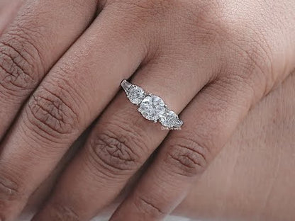 Five Stone Round And Tapered Baguette Diamond Ring