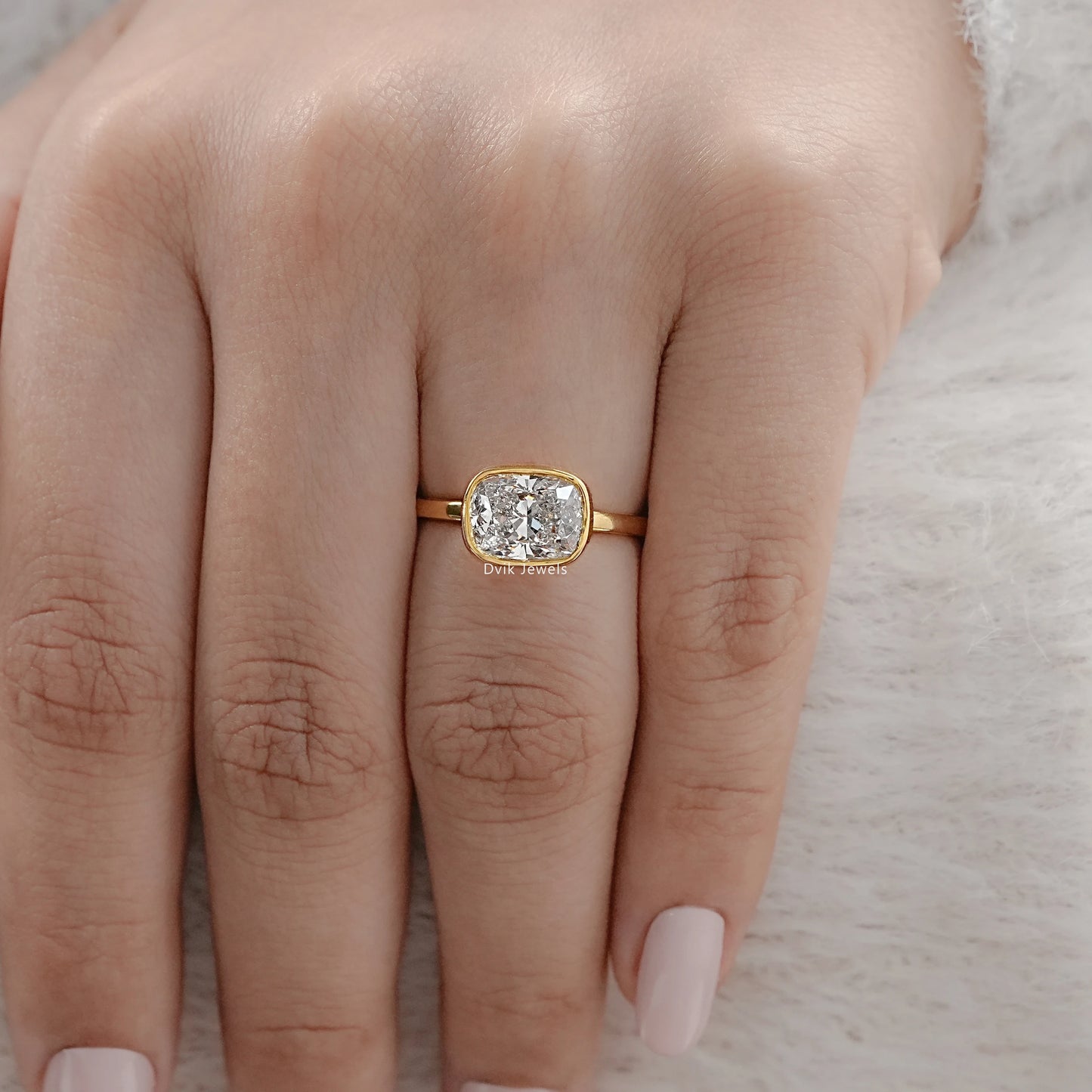 Cushion Cut East-West Bezel Solitaire Engagement Ring Ring